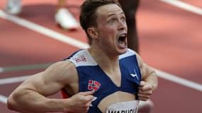 Le Norvégien Karsten Warholm après son sacre sur 400 m haies en ayant battu son propre record du monde, le 3 août 2021, aux Jeux olympiques de Tokyo