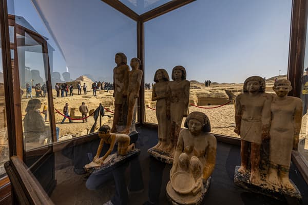 Statues discovered in pharaonic tombs are presented to the press, in Saqqara, Egypt, on January 26, 2023.