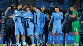 Les joueurs de l'Uruguay célèbrent leur qualification pour la Coupe du monde 2026 après leur victoire contre le Pérou (3-0), le 4 septembre 2025