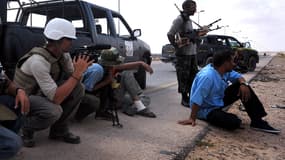 James Foley, journaliste américain tué par l'Etat islamique, en plein travail le 29 septembre 2011. Steven Sotloff est lui aussi menacé de mort par les jihadistes.