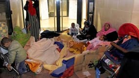 Demandeurs d'asile somaliens dans une rue du centre-ville d'Angers. Confrontée depuis trois ans à un afflux sans précédent de migrants africains, la ville s'inquiète de la saturation de ses structures d'accueil, qui provoque des tensions avec les autres p