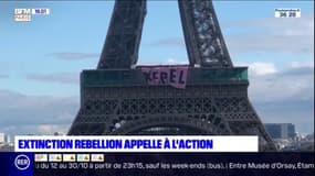Extinction Rébellion déploie une banderole sur la tour Eiffel