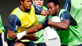 Thierry Dusautoir avec Fulgence Ouedraogo