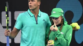 Jo-Wilfried Tsonga et la ramasseuse de balles