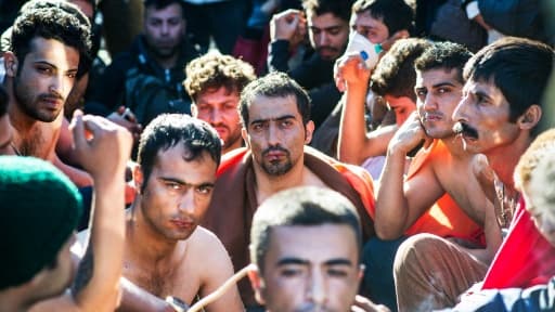 Migrants et réfugiés, les lèvre cousues, le 23 novembre 2015, à la frontière gréco-macédonienne