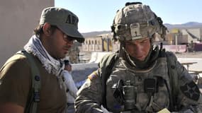 Le sergent Robert Bales, à droite sur la photo, en 2011 en Afghanistan. Mercredi, il a plaidé coupable d'assassinat de 16 villageois afghans.