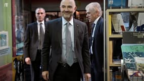 Le commissaire européen Pierre Moscovici lors de la présentation de son dernier livre, "Dans ce clair-obscur surgissent les monstres", à Athènes, le 8 février 2018