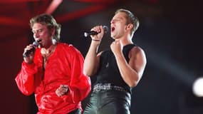 Johnny et David Hallyday au parc des Princes, à Paris, le 18 juin 1993