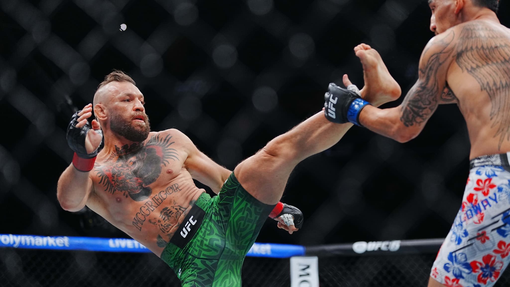 https://images.bfmtv.com/6gxN2miNkDdB1IDJyuwDE5N9xxw=/0x5:2048x1157/images/Conor-Mcgregor-face-a-Max-Holloway-a-l-UFC-329-a-Las-Vegas-le-11-juillet-2026-2319059.jpg