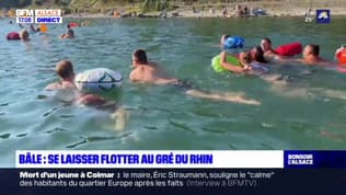 À Bâle, des nageurs se laissent porter au gré du courant du Rhin