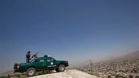 Policier afghan sur les hauteurs de Kaboul. Les forces afghanes assumeront entièrement la sécurité de certaines provinces d'ici la fin de l'année, avec l'objectif de prendre le contrôle total du pays d'ici 2014, peut-on lire dans le communiqué final de la
