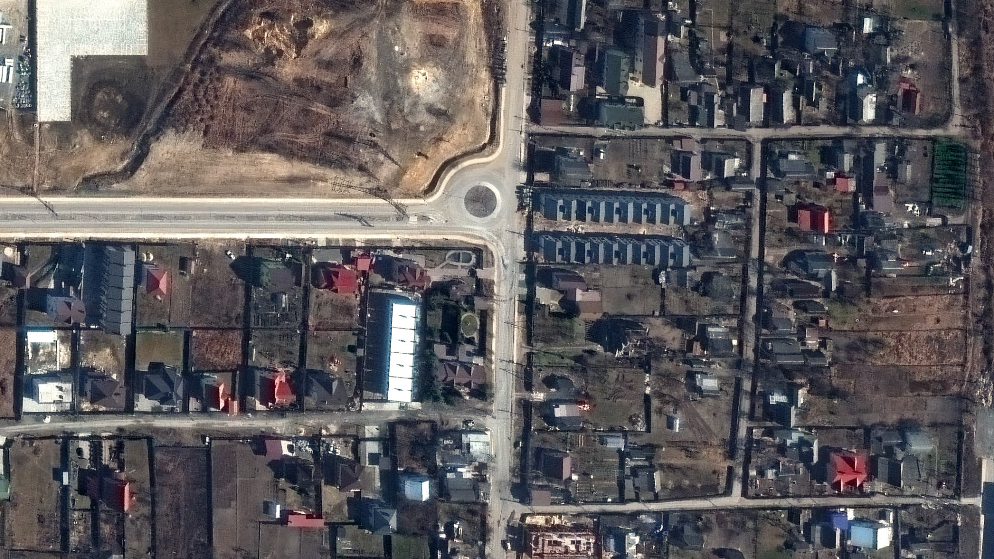 Une image satellite à Boutcha, le 19 mars 2022, montrant les positions de corps de civils tués par l'armée russe