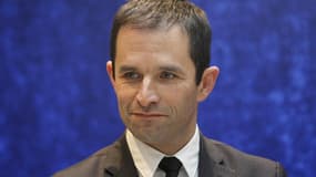 Benoît Hamon, ministre délégué à l'Economie solidaire, assure ne pas avoir de conflit avec Jean-Marc Ayrault, après son refus de signer la contribution du Premier ministre et de Martine Aubry en vue du congrès du Parti socialiste à l'automne. /Photo prise