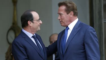 François Hollande et Arnold Schwarzenegger à l'Elysée en 2014