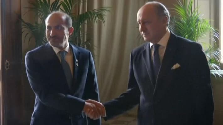 Laurent Fabius et le président de la coalition nationale de l'opposition syrienne, Ahmad Jarba. Laurent Fabius et le président de la coalition nationale de l'opposition syrienne, Ahmad Jarba.