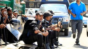 Policiers égyptiens anti-émeutes, place Tahrir, au Caire. La branche yéménite d'Al Qaïda a appelé samedi les musulmans à poursuivre les manifestations et à tuer de nouveaux diplomates américains en représailles au film islamophobe diffusé sur internet, al