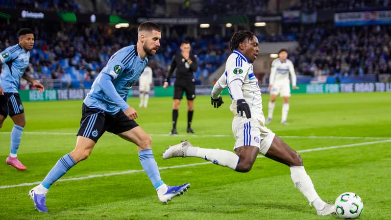 Kenan Bajric of SK Slovan Bratislava and Martial Godo of RC Strasbourg 2 octobre