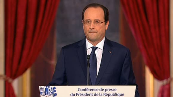 Les lèvres de François Hollande étaient serrées.