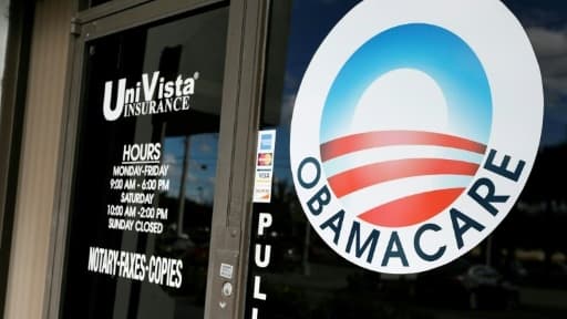Le logo Obamacare sur la vitrine d'une agence d'assurance santé, le 10 janvier 2017 à Miami, en Floride