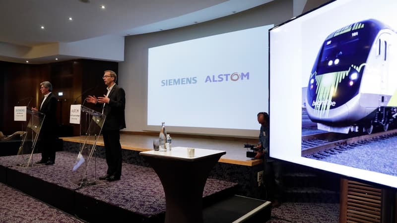 Joe Kaeser (Siemens) et Henri Poupart-Lafarge (Alstom) lors de la présentation de leur projet de rapprochement à Paris, en septembre 2017.