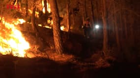 Les pompiers espagnols luttent contre les flammes près de la frontière avec la France. 