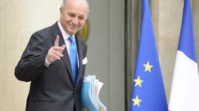 Laurent Fabius estime qu'un touriste qui trouve porte close le dimanche ne revient pas le mardi