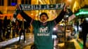Un supporter de l'équipe de l'équipe de St-Etienne, qui a remporté la coupe de la ligue samedi contre Rennes.
