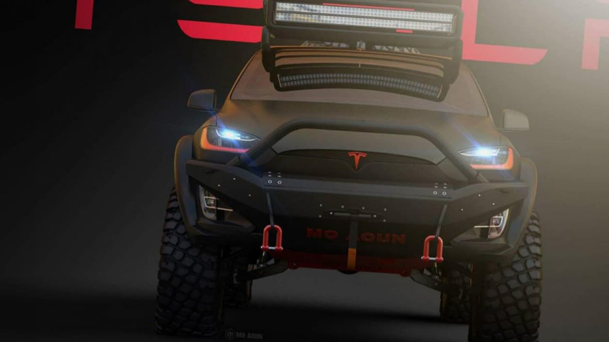 Avec son pare-buffle, sa bande de phares LED et ses crochets de remorquage, le Model X en mode baroudeur de l'extrême. Avec son pare-buffle, sa bande de phares LED et ses crochets de remorquage, le Model X en mode baroudeur de l'extrême.