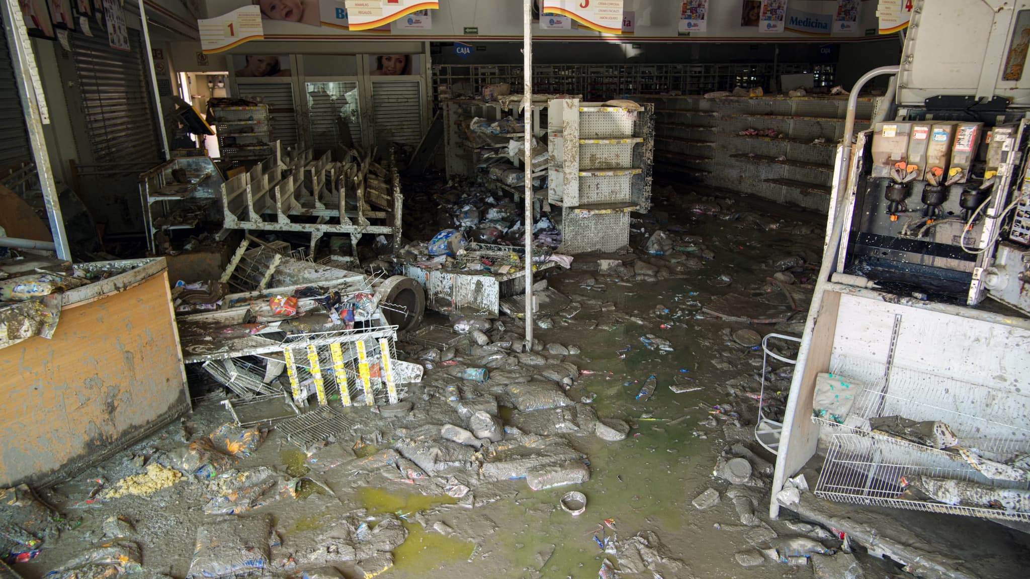 Un magasin pillé après les inondations qui ont touché la ville d'Alamo dans l'État de Veracruz au Mexique ce lundi 13 octobre 2025 Un magasin pillé après les inondations qui ont touché la ville d'Alamo dans l'État de Veracruz au Mexique ce lundi 13 octobre 2025