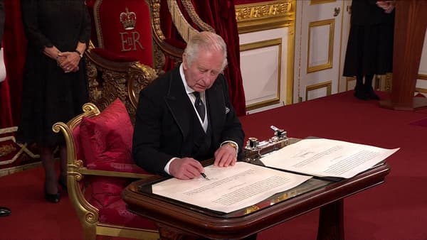 King Charles III signs his oath