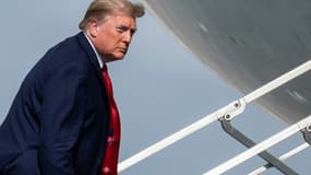 US President Donald Trump boards Air Force One on December 31, 2020 to leave his vacation in Florida early as he fumes against his election loss and as tensions rise with Iran 