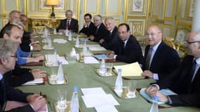 François Hollande et les partenaires sociaux à l'Elysée le 19 juin.