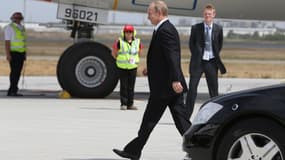 Poutine quitte le G20 avant la clôture, le 16 novembre 2014.
