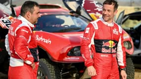 Sébastien Loeb (d) et son copilote Daniel Elena à Djeddah, le 31 décembre 2020