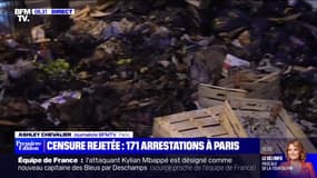 Retraites: dans le quartier de l'Opéra à Paris, les rues jonchées de poubelles incendiées après la manifestation