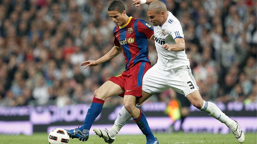 Afellay avec le Barça face au Real de Pepe en 2011 Afellay avec le Barça face au Real de Pepe en 2011