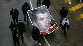 Le portrait du militant indépendantiste Yvan Colonna lors d'une manifestation de soutien à Bastia, le 13 mars 2022