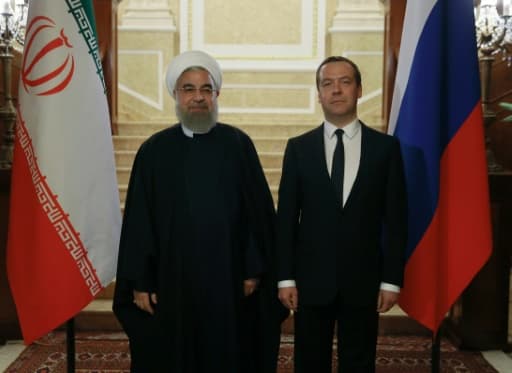 Le président iranien Hassan Rouhani (g) et le Premier ministre russe Dmitri Medvedev, le 27 mars 2017 à la résidence Gorki, près de Moscou Le président iranien Hassan Rouhani (g) et le Premier ministre russe Dmitri Medvedev, le 27 mars 2017 à la résidence Gorki, près de Moscou