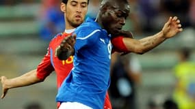 Sergio Busquets et Mario Balotelli