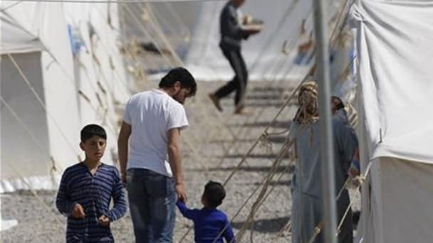 Au camp de réfugiés syriens d'Islahiye, à Gaziantep, mardi. Selon les autorités turques, le nombre de réfugiés syriens arrivés en Turquie voisine a fait un bond avec plus de 2.800 passages jeudi, soit plus du double du précédent record sur un jour. /Photo