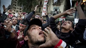 Le Caire, 27 novembre 2011. Des manifestants scandent des slogans durant un rassemblement contre le Conseil Militaire Egyptien sur la place Tahrir.