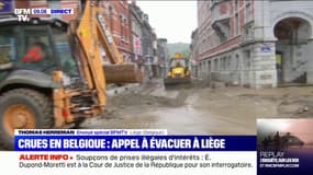 À Liège, les pelleteuses s'activent pour évacuer la boue des rues