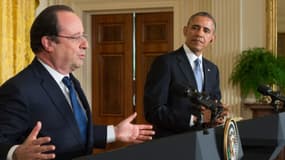 François Hollande et Barack Obama, ici le 11 février à Washington, ont menacer de "nouvelles mesures contre la Russie" faute de "désescalde" en Ukraine.