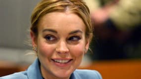 L'actrice américaine Lindsay Lohan a été arrêtée dans la nuit de mardi à mercredi pour délit de fuite après avoir heurté un piéton avec sa voiture à New York. /Photo prise le 29 mars 2012/REUTERS/Joe Klamar/Pool