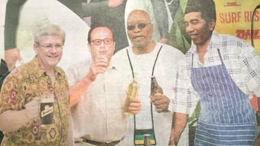 François Hollande sirote un verre de vin à la une d'un tabloïd australien, vendredi 14 novembre.