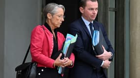 Le Première ministre Elisabeth Borne et le ministre du Travail Olivier Dussopt, à l'Elysée le 26 septembre 2022