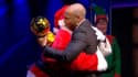 Thierry Henry avec Micah Richards déguisé en Père Noël, le 13 décembre 2023