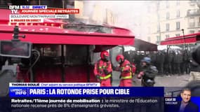 Retraites: départ de feu sur la devanture de La Rotonde lors de la manifestation à Paris