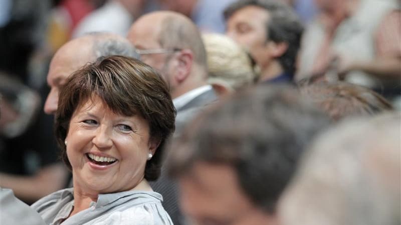 Martine Aubry, première secrétaire du PS, laisse de plus en plus clairement entendre qu'elle ne briguera pas un nouveau mandat mais réclame "un peu de patience" à ceux qui ont hâte de connaître le nom de son successeur. /Photo prise le 24 août 2012/REUTER