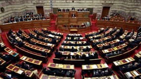 Le parlement grec a approuvé lundi la loi d'austérité très impopulaire destinée à assurer l'octroi au pays d'une deuxième aide financière de la part de l'Union européenne et du Fonds monétaire international et à éviter une cessation de paiement. /Photo pr